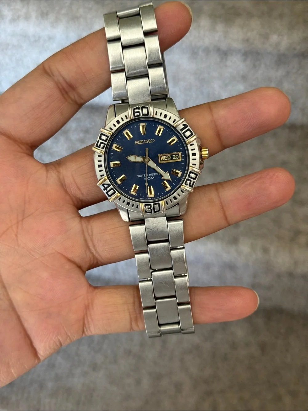 Seiko Blue Dial Stainless Steel Watch with Gold Accents Mens Watch